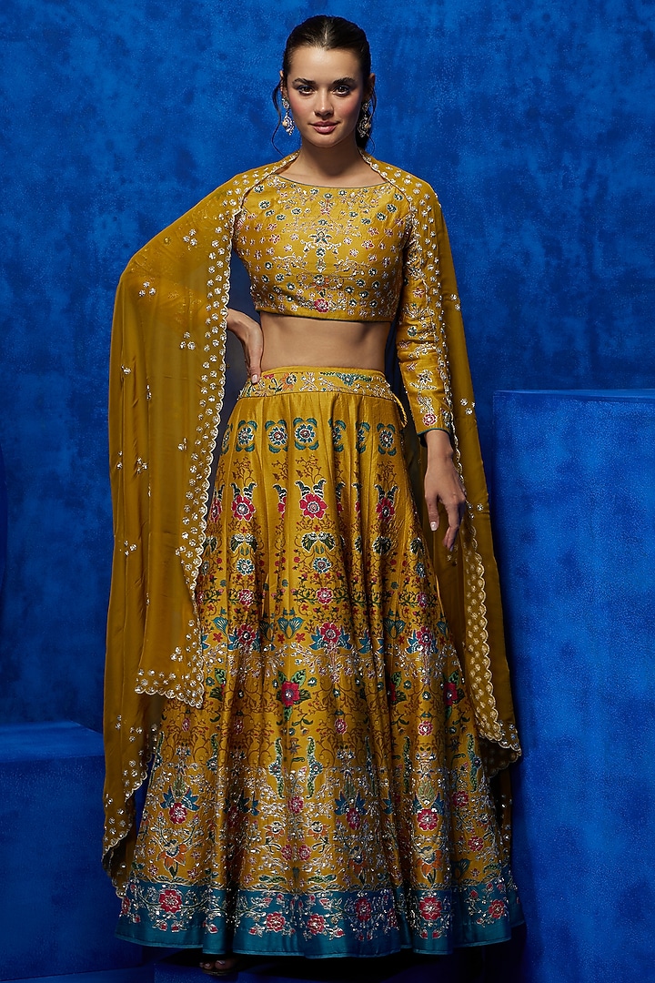 Mustard Soft Silk Floral Printed & Zari Embroidered Wedding Lehenga Set by Nautanky By Nilesh Parashar at Pernia's Pop Up Shop