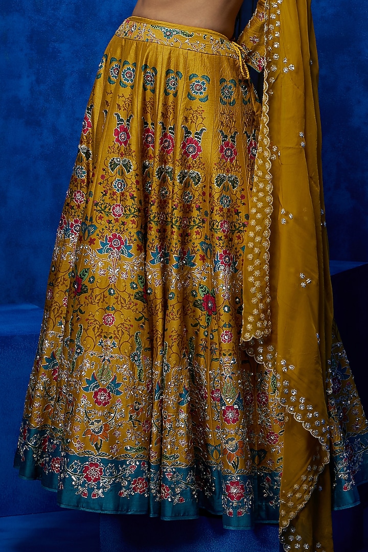 Mustard Soft Silk Floral Printed & Zari Embroidered Wedding Lehenga Set by Nautanky By Nilesh Parashar at Pernia's Pop Up Shop