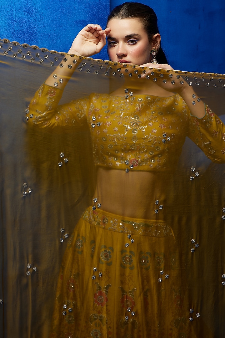 Mustard Soft Silk Floral Printed & Zari Embroidered Wedding Lehenga Set by Nautanky By Nilesh Parashar at Pernia's Pop Up Shop