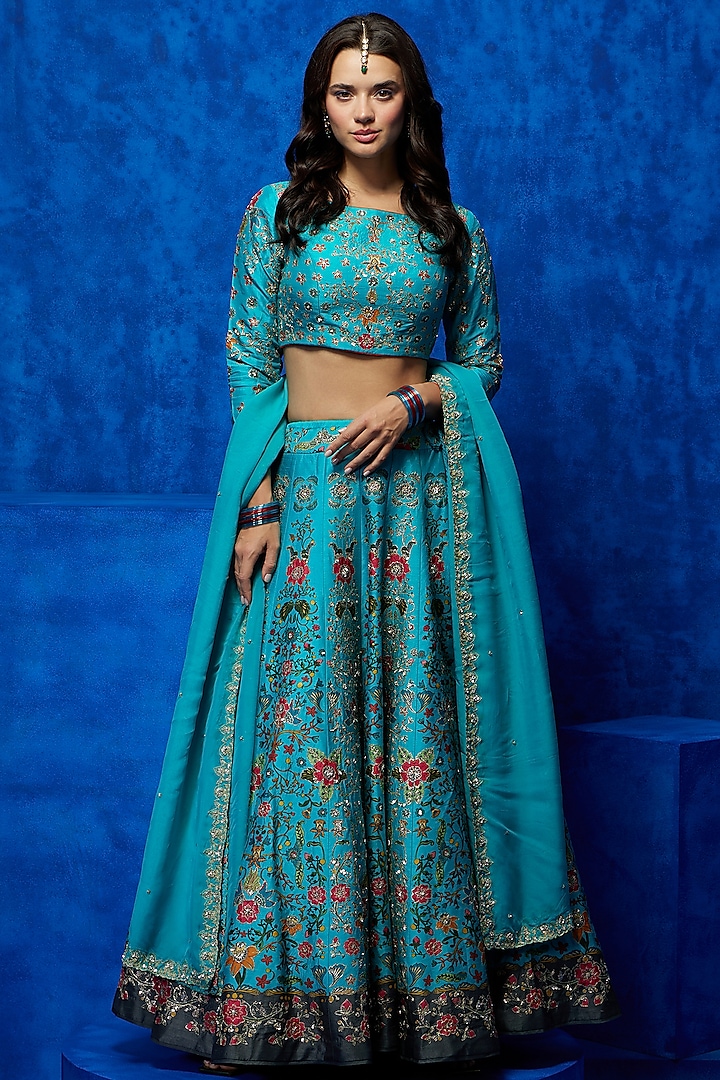 Turquoise Soft Silk Floral Printed & Zari Embroidered Wedding Lehenga Set by Nautanky By Nilesh Parashar at Pernia's Pop Up Shop