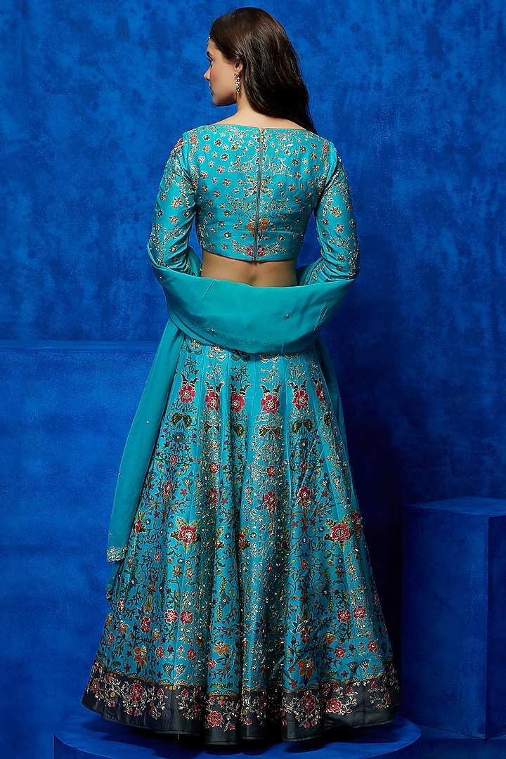 Turquoise Soft Silk Floral Printed & Zari Embroidered Wedding Lehenga Set by Nautanky By Nilesh Parashar at Pernia's Pop Up Shop