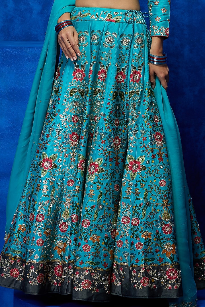 Turquoise Soft Silk Floral Printed & Zari Embroidered Wedding Lehenga Set by Nautanky By Nilesh Parashar at Pernia's Pop Up Shop