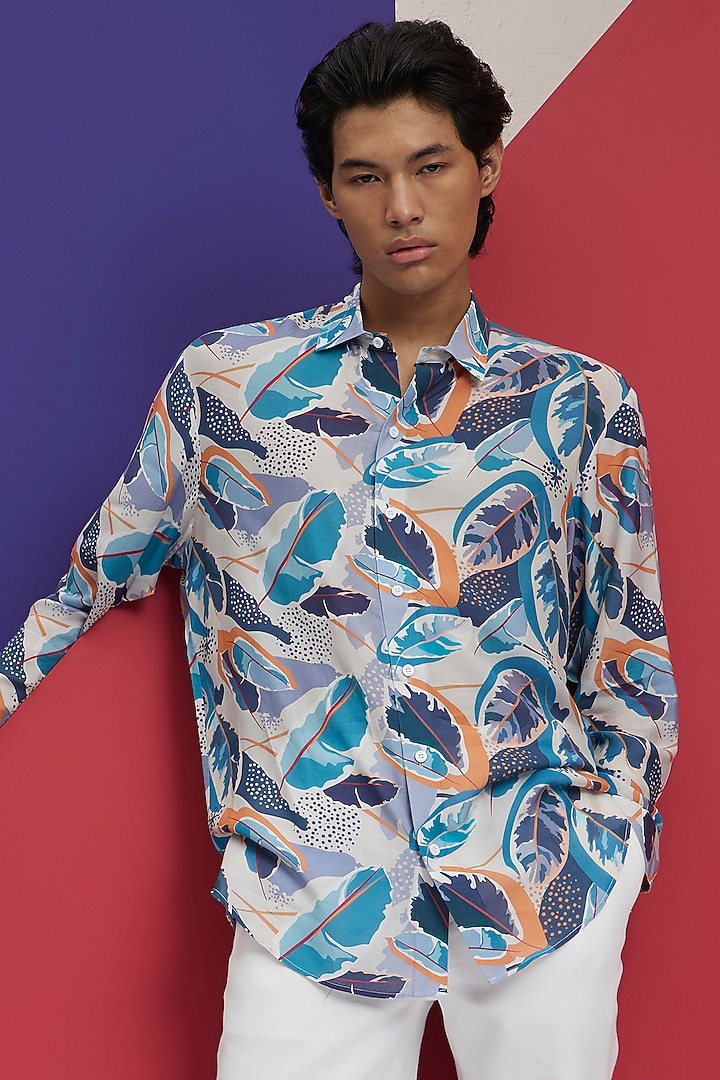 Ivory & Aqua Fluid Cotton Tropical Printed Party Wear Shirt by Nautanky By Nilesh Parashar Men at Pernia's Pop Up Shop