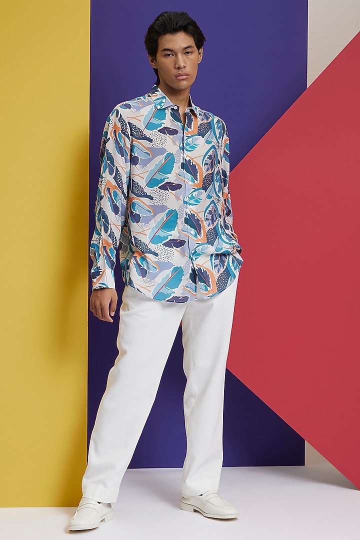 Ivory & Aqua Fluid Cotton Tropical Printed Party Wear Shirt by Nautanky By Nilesh Parashar Men at Pernia's Pop Up Shop