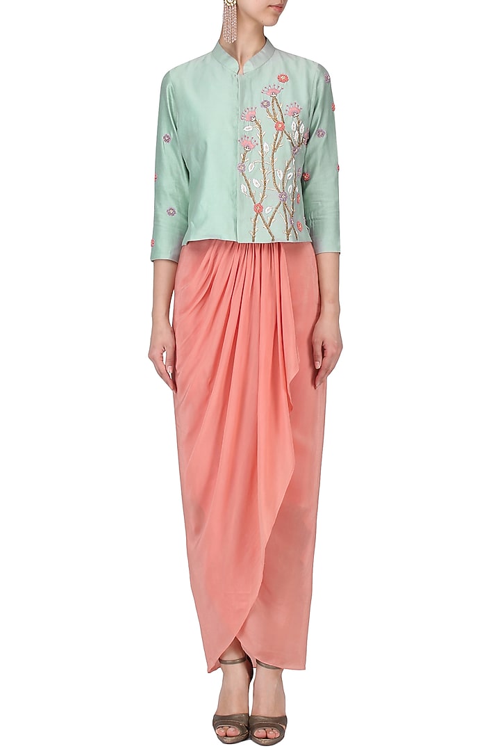 Duck egg embroidered jacket with millenium pink ruffle skirt available only at Pernia's Pop Up Shop.