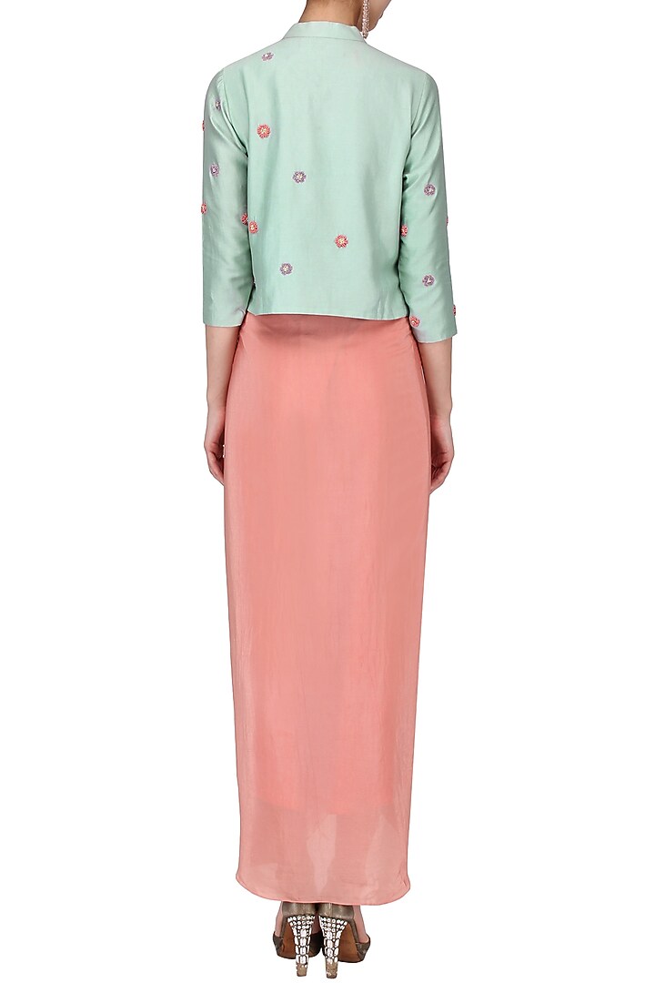 Duck egg embroidered jacket with millenium pink ruffle skirt available only at Pernia's Pop Up Shop.
