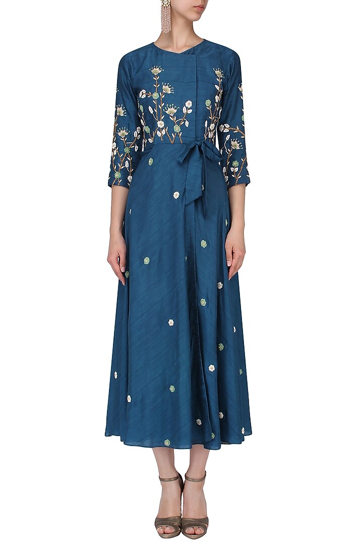 Teal floral embroidered wrap dress available only at Pernia's Pop Up Shop.