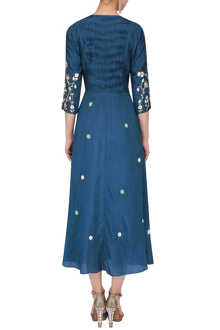 Teal floral embroidered wrap dress available only at Pernia's Pop Up Shop.