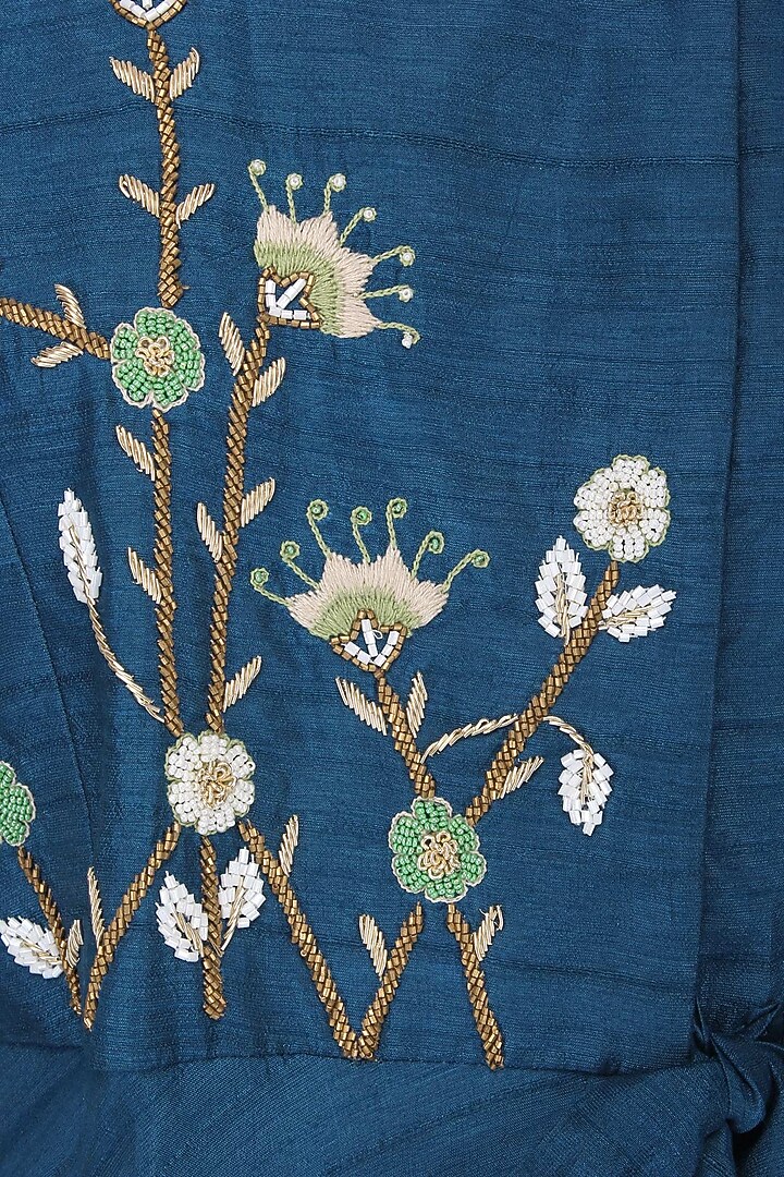 Teal floral embroidered wrap dress available only at Pernia's Pop Up Shop.