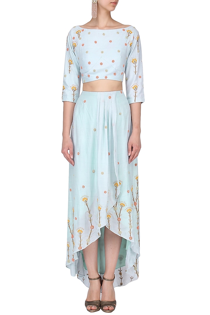 Powder blue embroidered crop top and asymmetric skirt available only at Pernia's Pop Up Shop.
