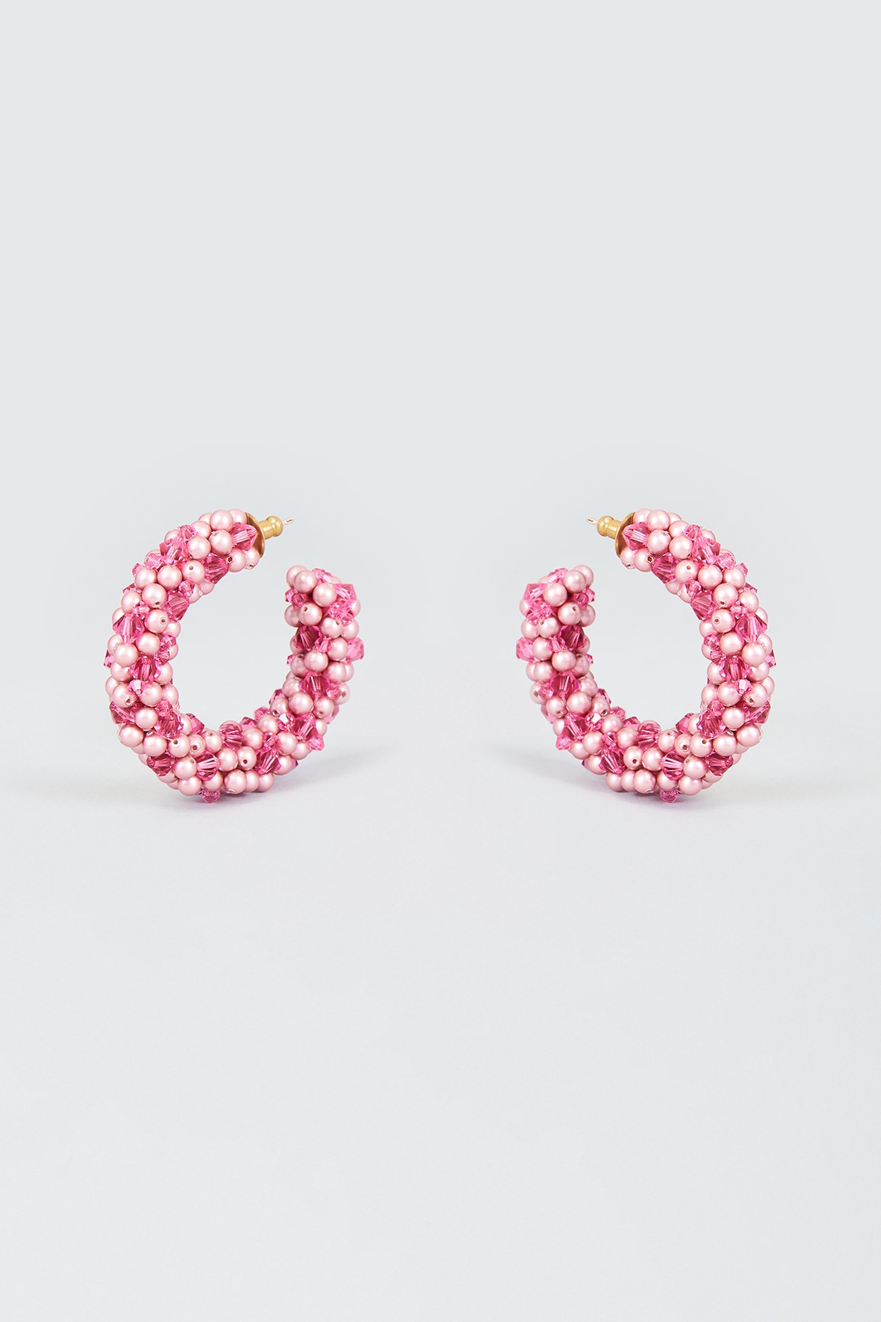 Swarovski Ortyx Hoop Earrings Triangle Cut Pink Rose GoldTone Plated   Jones Bros Jewelers