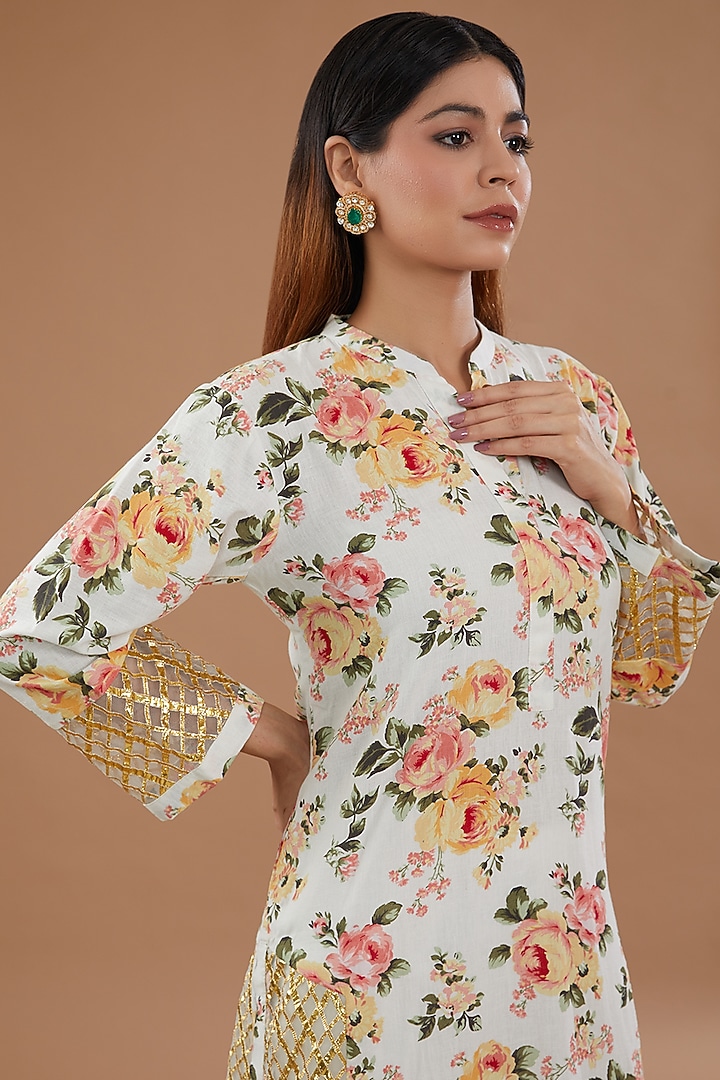Ivory Linen Embellished & Floral Printed Kurta Set by NOW WITH PRACHI at Pernia's Pop Up Shop