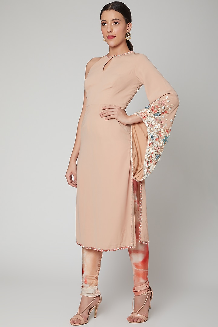 Salmon Pink Embroidered Kurta With Trousers by Nirmooha