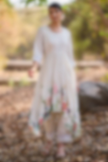 Ivory Mul Silk Floral Printed & Hand Embroidered Asymmetrical Kurta Set by Nirmooha at Pernia's Pop Up Shop