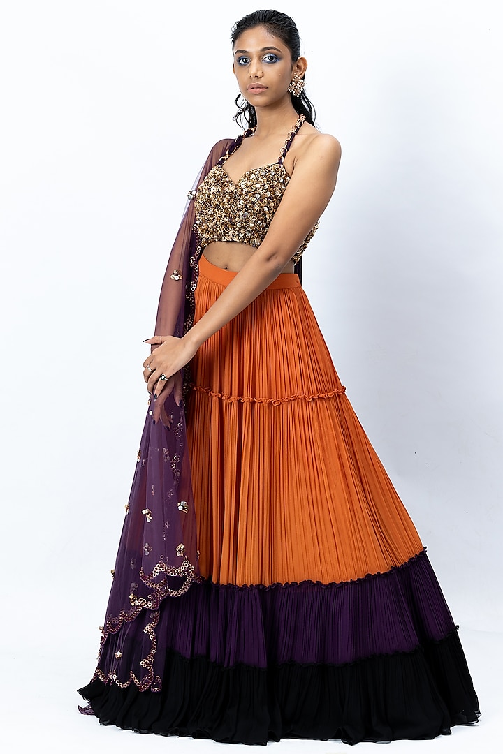 Multi Colored Georgette Tiered Lehenga Set by Nirmooha