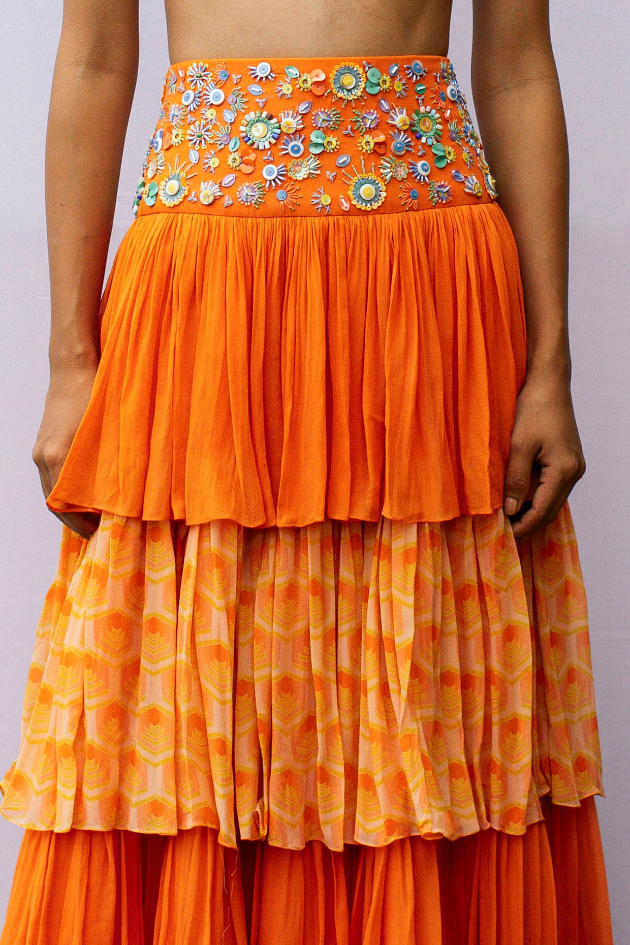 Orange Georgette Hand Embroidered Layered Tiered Skirt by Nirmooha at Pernia s Pop Up Shop 2024