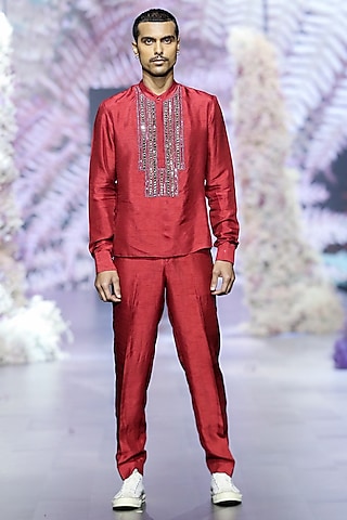 Intense Rust Crepe Tapered Pants by Nirmooha Men