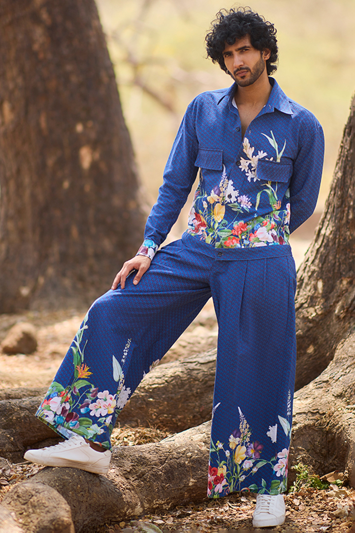 Blue Denim Floral Printed Flared Pants by Nirmooha Men