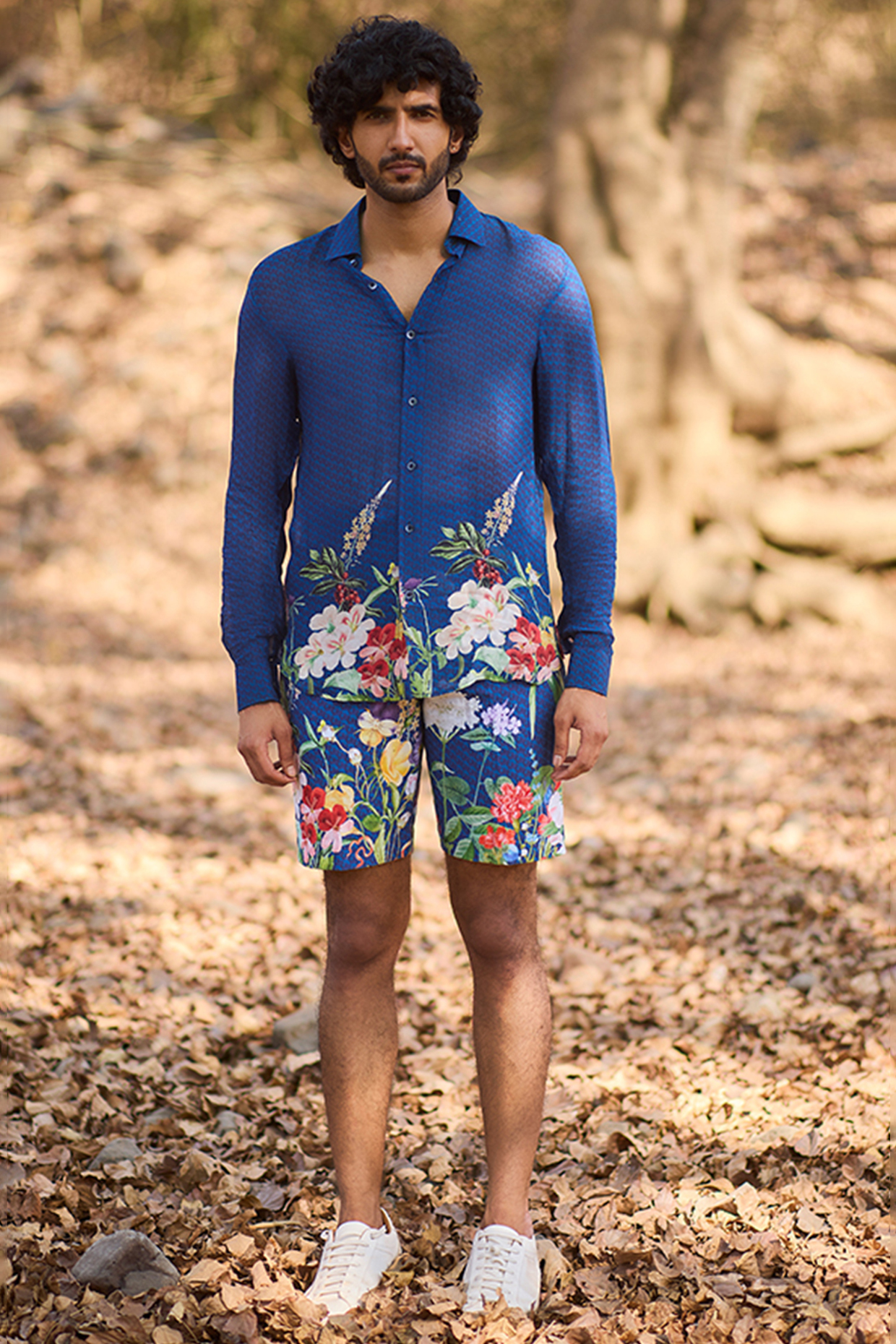 Blue Denim & Chinon Floral Printed Shorts by Nirmooha Men