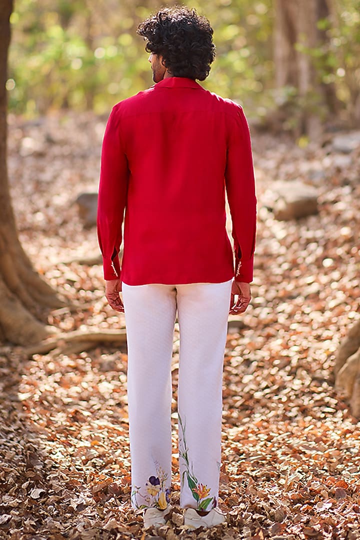 Ivory Denim Floral Printed Straight-Leg Pants by Nirmooha Men at Pernia's Pop Up Shop