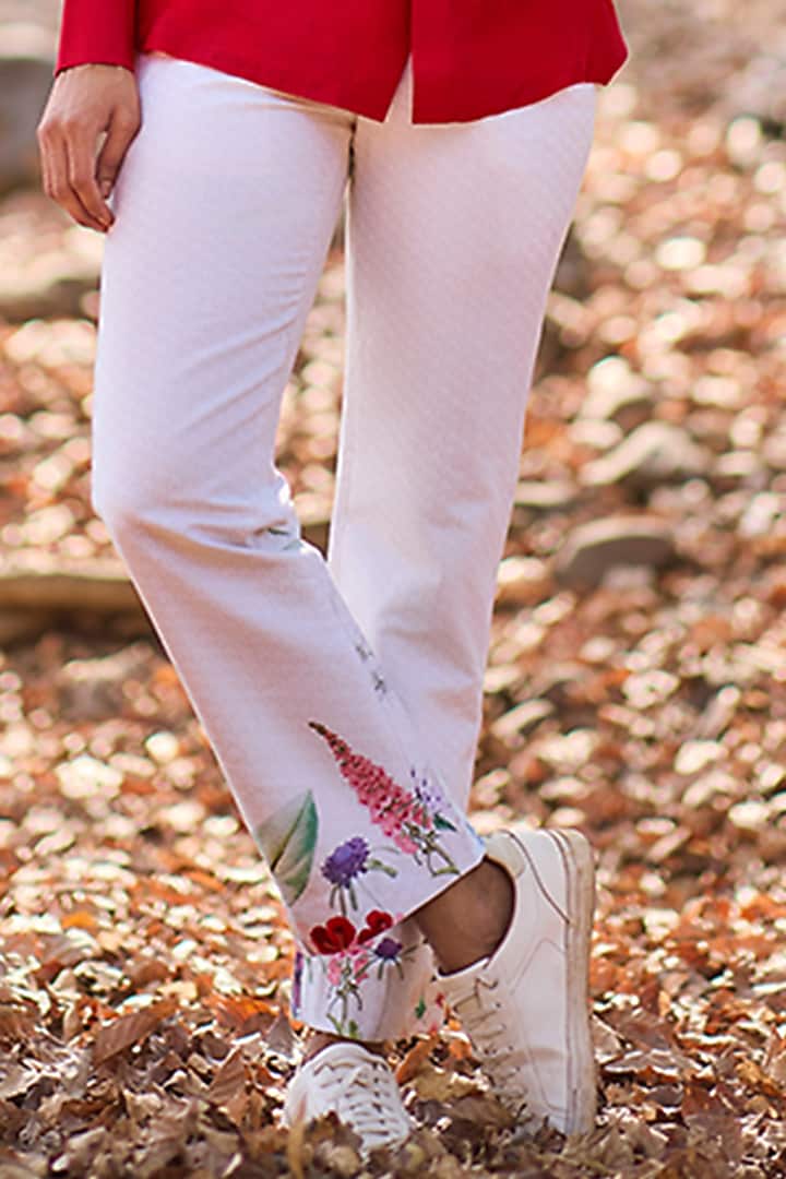 Ivory Denim Floral Printed Straight-Leg Pants by Nirmooha Men at Pernia's Pop Up Shop