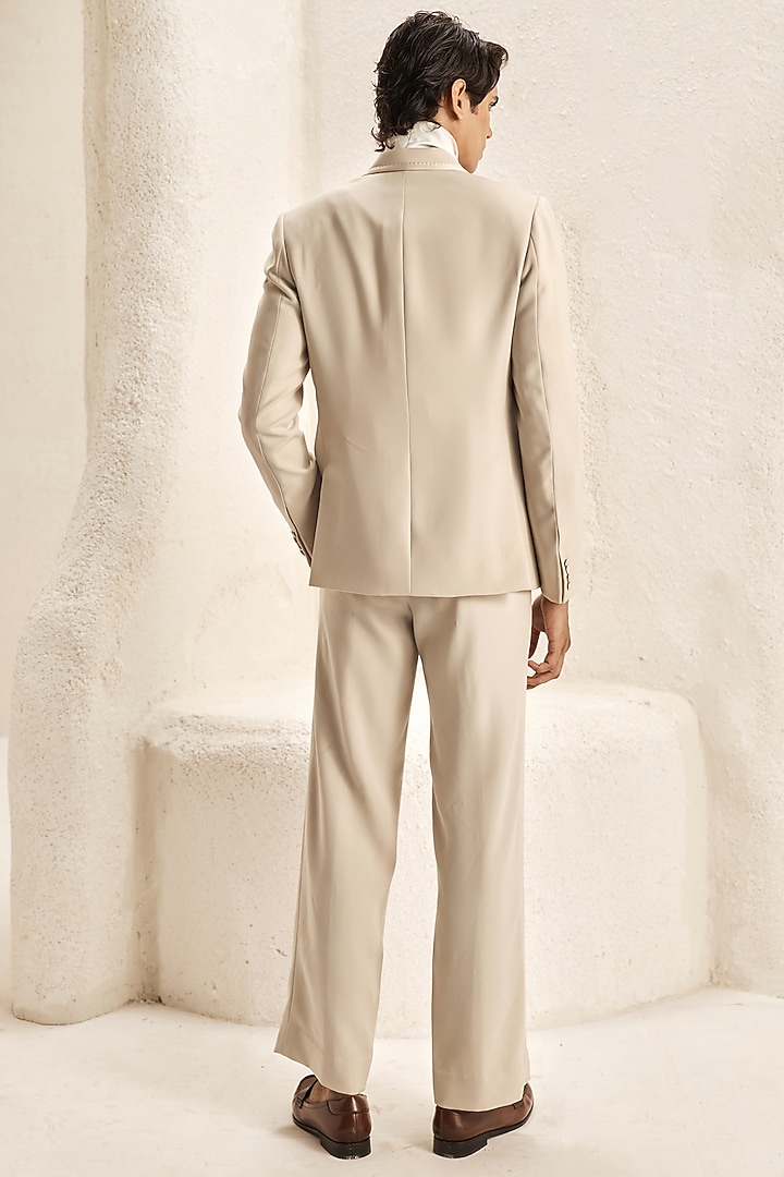 Pearl Ivory Micro Fabric & Bemberg Satin Double-Breasted Tuxedo Set by Nirmooha Men at Pernia's Pop Up Shop