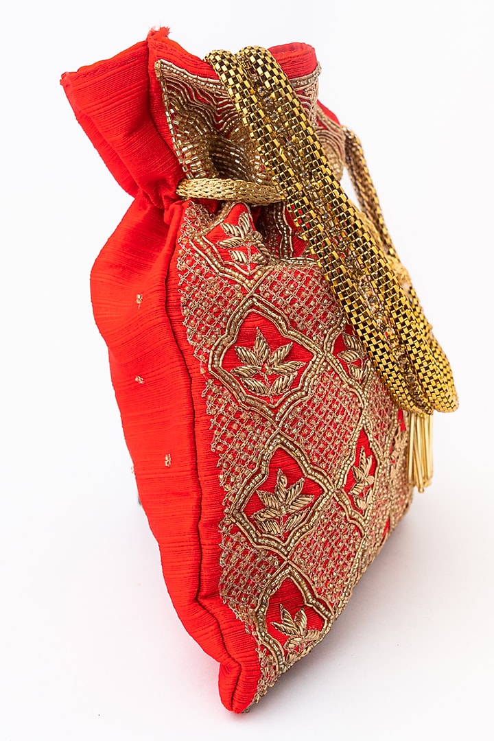 Red & Gold Raw Silk Embroidered Potli by NR By Nidhi Rathi at Pernia's Pop Up Shop