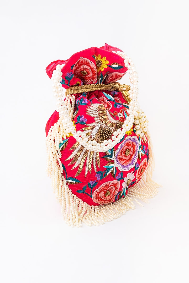 Pink & Purple Raw Silk Embroidered Potli by NR By Nidhi Rathi at Pernia's Pop Up Shop