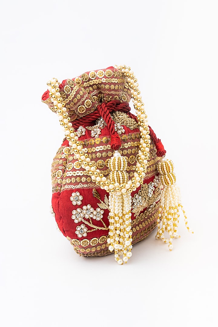 Maroon & Gold Raw Silk Embroidered Potli by NR By Nidhi Rathi at Pernia's Pop Up Shop