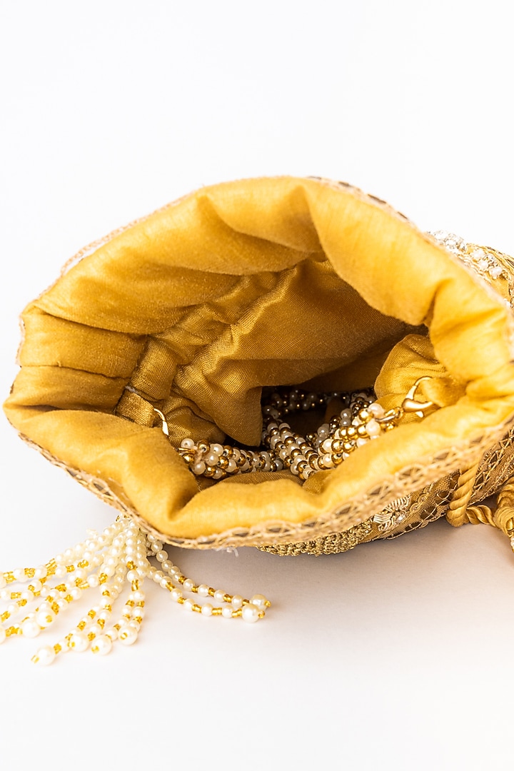 Gold & White Raw Silk Embroidered Potli by NR By Nidhi Rathi at Pernia's Pop Up Shop