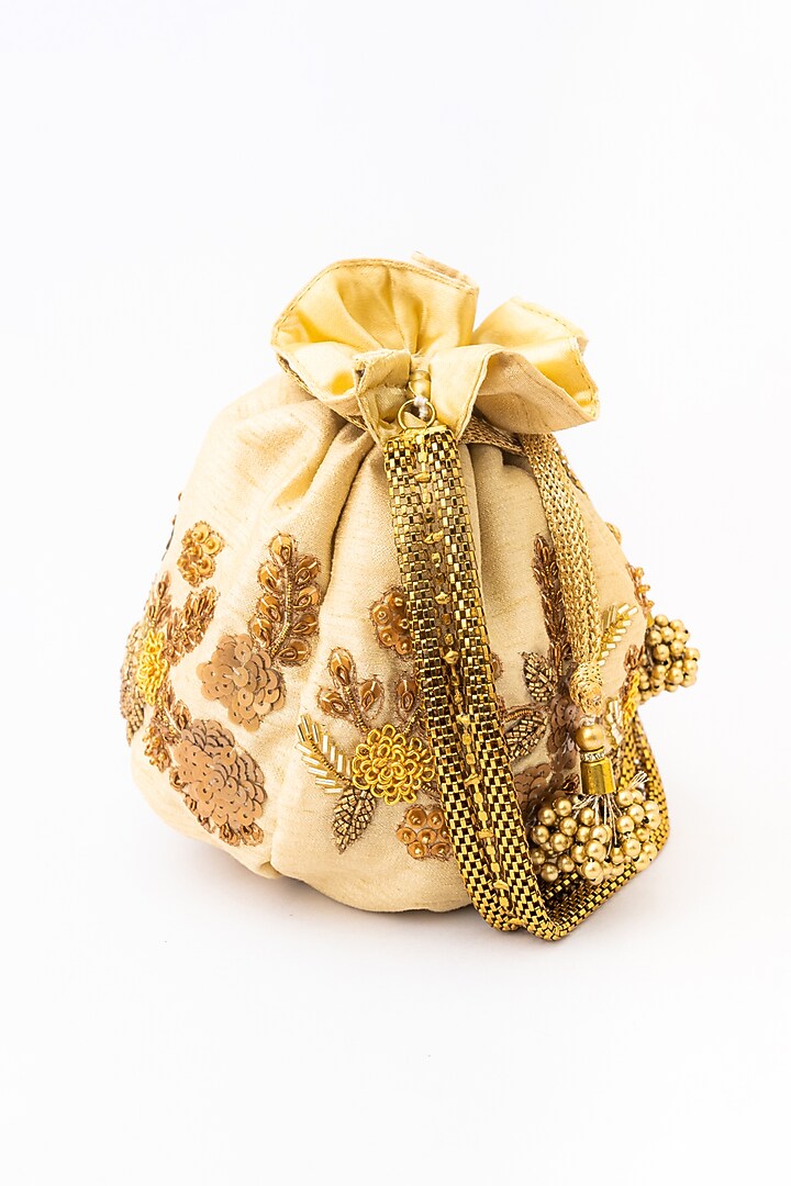 Peach & Gold Raw Silk Embroidered Potli by NR By Nidhi Rathi at Pernia's Pop Up Shop