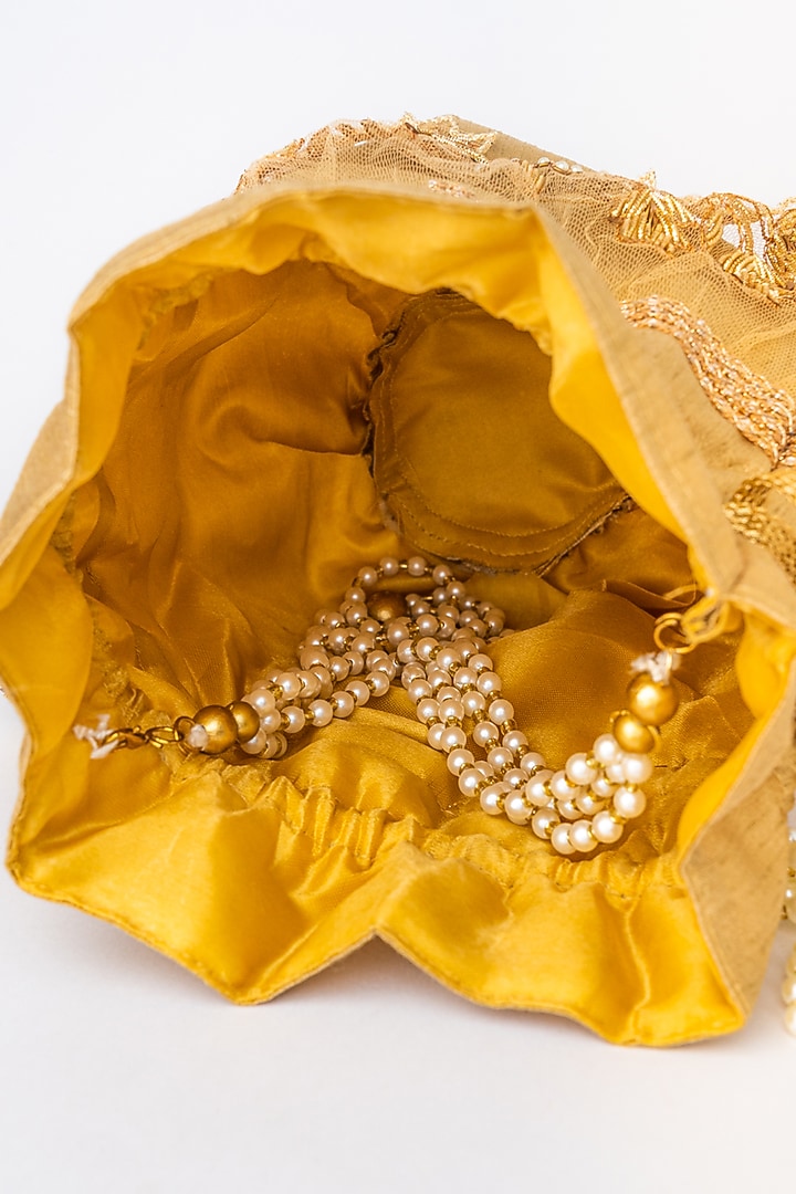 Gold & White Raw Silk Embroidered Potli by NR By Nidhi Rathi at Pernia's Pop Up Shop