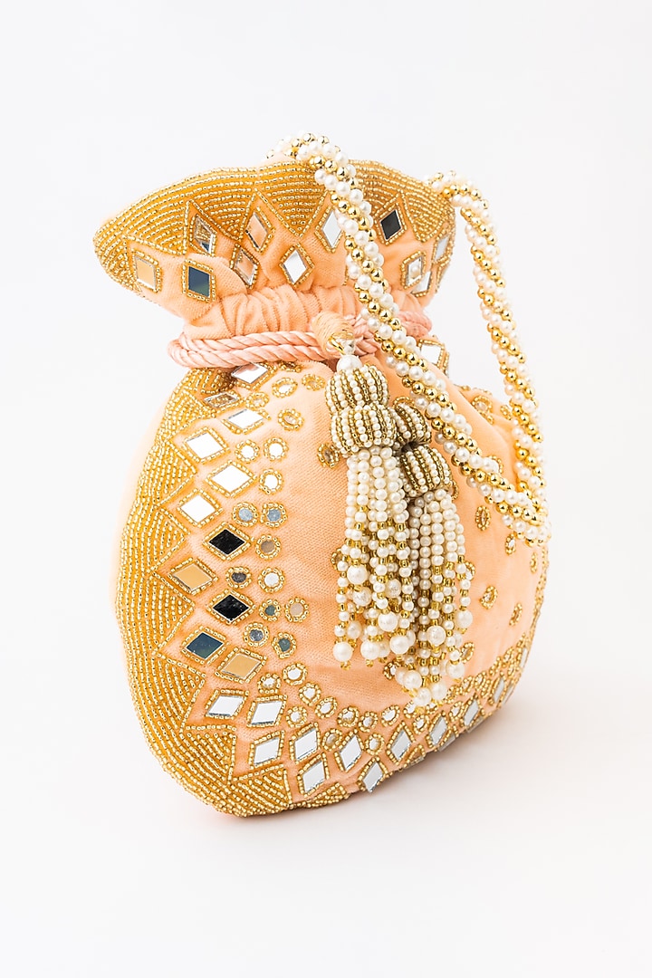 Peach & Gold Velvet Embroidered Potli by NR By Nidhi Rathi at Pernia's Pop Up Shop