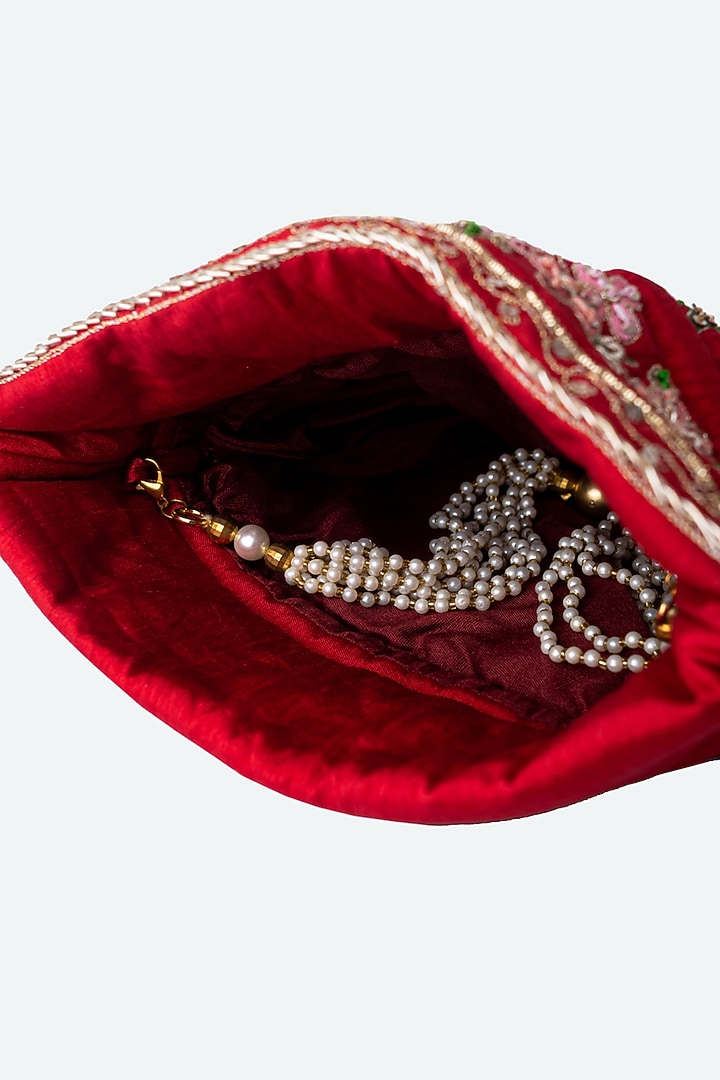 Red Raw Silk Hand Embroidered Potli by NR By Nidhi Rathi at Pernia's Pop Up Shop