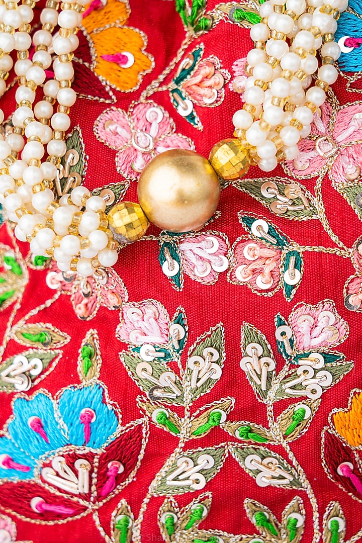 Red Raw Silk Hand Embroidered Potli by NR By Nidhi Rathi at Pernia's Pop Up Shop