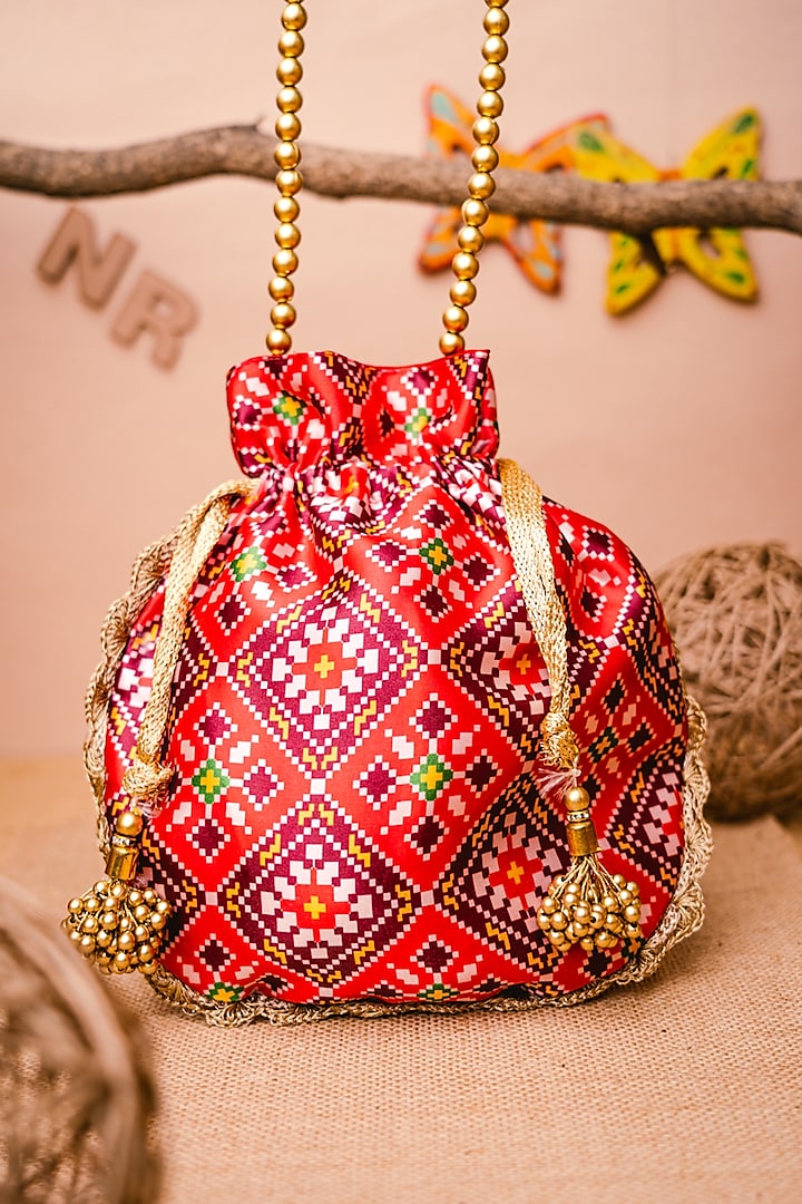 Pink Satin Printed & Embroidered Potli by NR By Nidhi Rathi at Pernia's Pop Up Shop