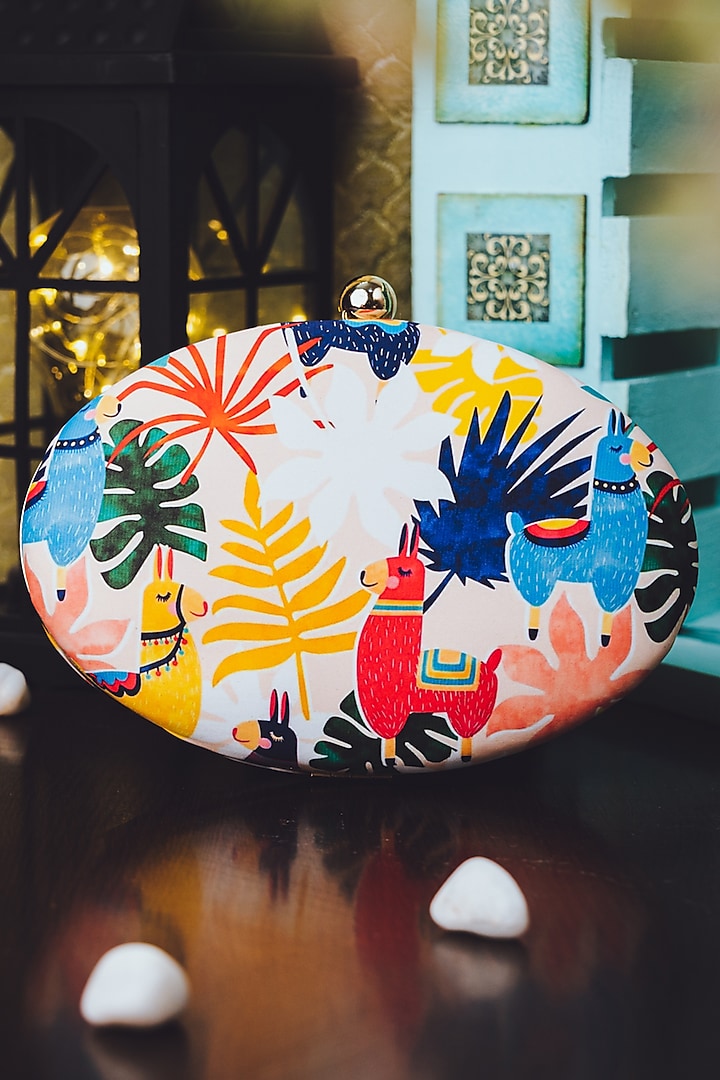 White Satin Digital Printed Oval Clutch by NR By Nidhi Rathi at Pernia's Pop Up Shop