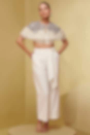 Ivory Crepe Flared Trousers by Not So Serious By Pallavi Mohan at Pernia's Pop Up Shop