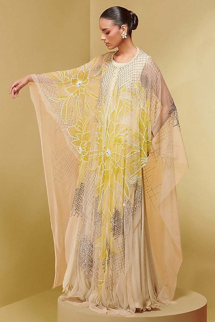 Ivory Tulle & Georgette Flora Applique Embroidered Kaftan by Not So Serious By Pallavi Mohan at Pernia's Pop Up Shop