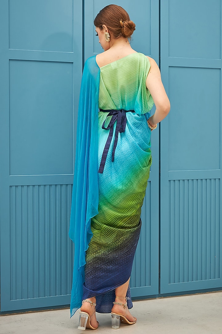 Fluorescent Turquoise & Marine Blue Ombre Chifffon Printed Festive Gown Saree With Belt by Naina Seth at Pernia's Pop Up Shop