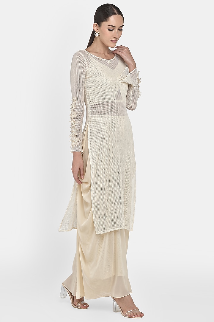 Ivory Hand Embroidered Kurta Set by Naina Seth at Pernia's Pop Up Shop