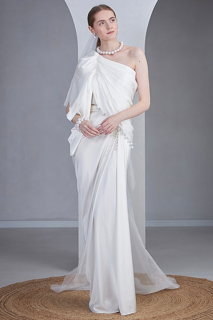 White Satin Silk Pearl Embellished One-Shoulder Gown by Naina Seth at Pernia's Pop Up Shop