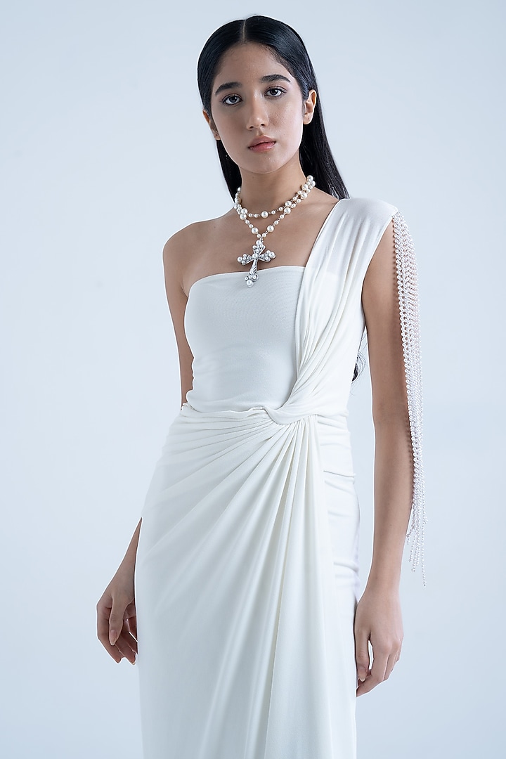 White Stretch Moss Crepe Embellished One-Shoulder Gown by Naina Seth at Pernia's Pop Up Shop