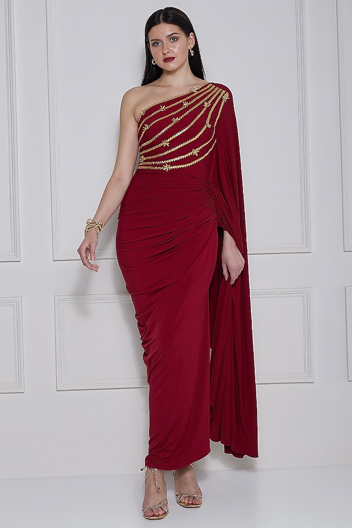 Maroon Stretch Knit Gota-Patti Work One-Shoulder Gown by Naina Seth at Pernia's Pop Up Shop