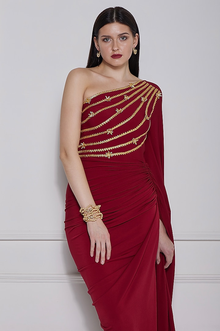 Maroon Stretch Knit Gota-Patti Work One-Shoulder Party Wear Gown by Naina Seth at Pernia's Pop Up Shop