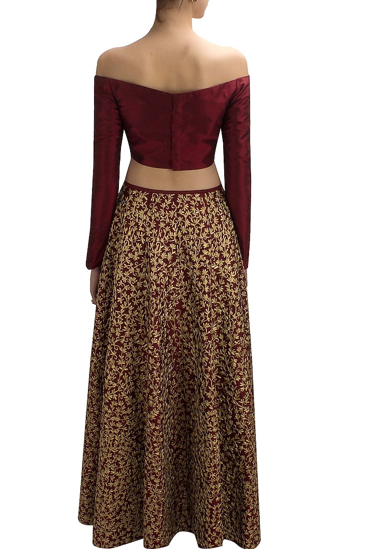 Maroon and gold floral embroidered lehenga set available only at Pernia's Pop Up Shop.