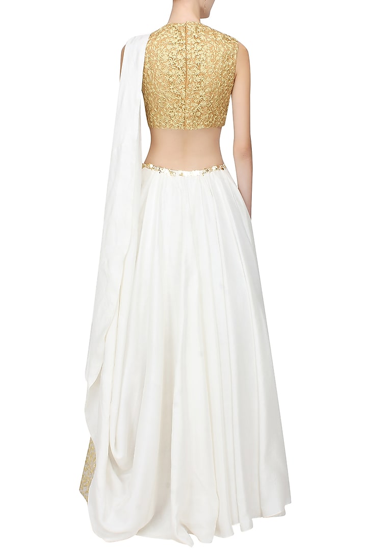 White one shoulder side drape lehenga and blouse set available only at Pernia's Pop Up Shop.