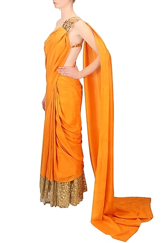 Orange and gold floral embroidered saree by Nikhil Thampi
