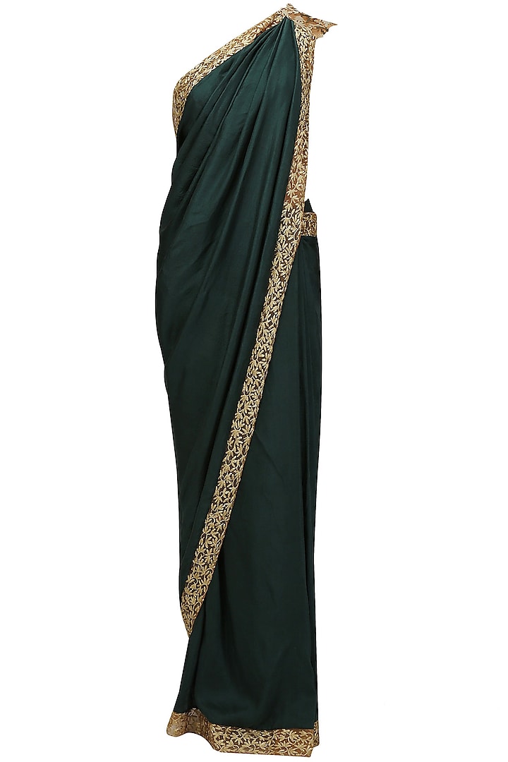 Green and gold embroidered saree by Nikhil Thampi