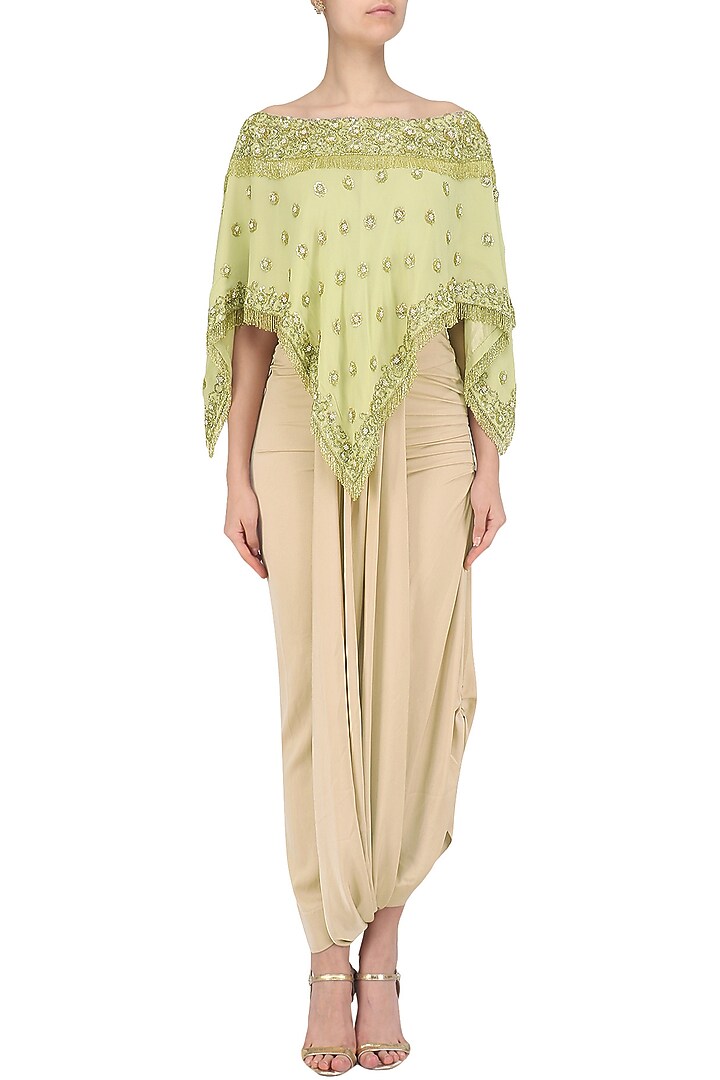 Mellow green off shoulder embroidered top with asymmetrical skirt available only at Pernia's Pop Up Shop.